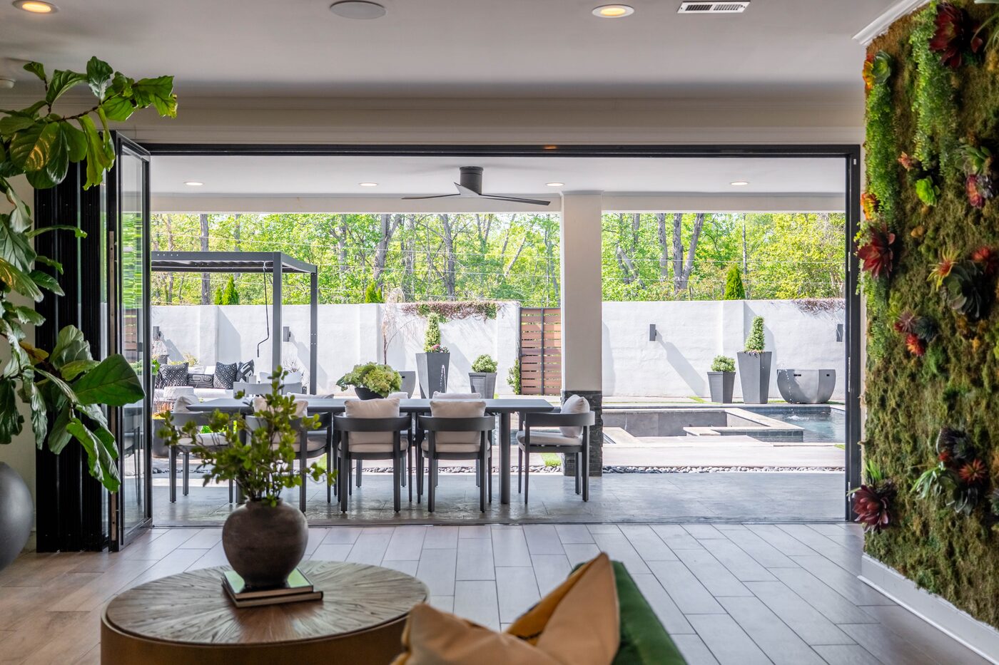 Terrace-level recreation room open to the pool terrace